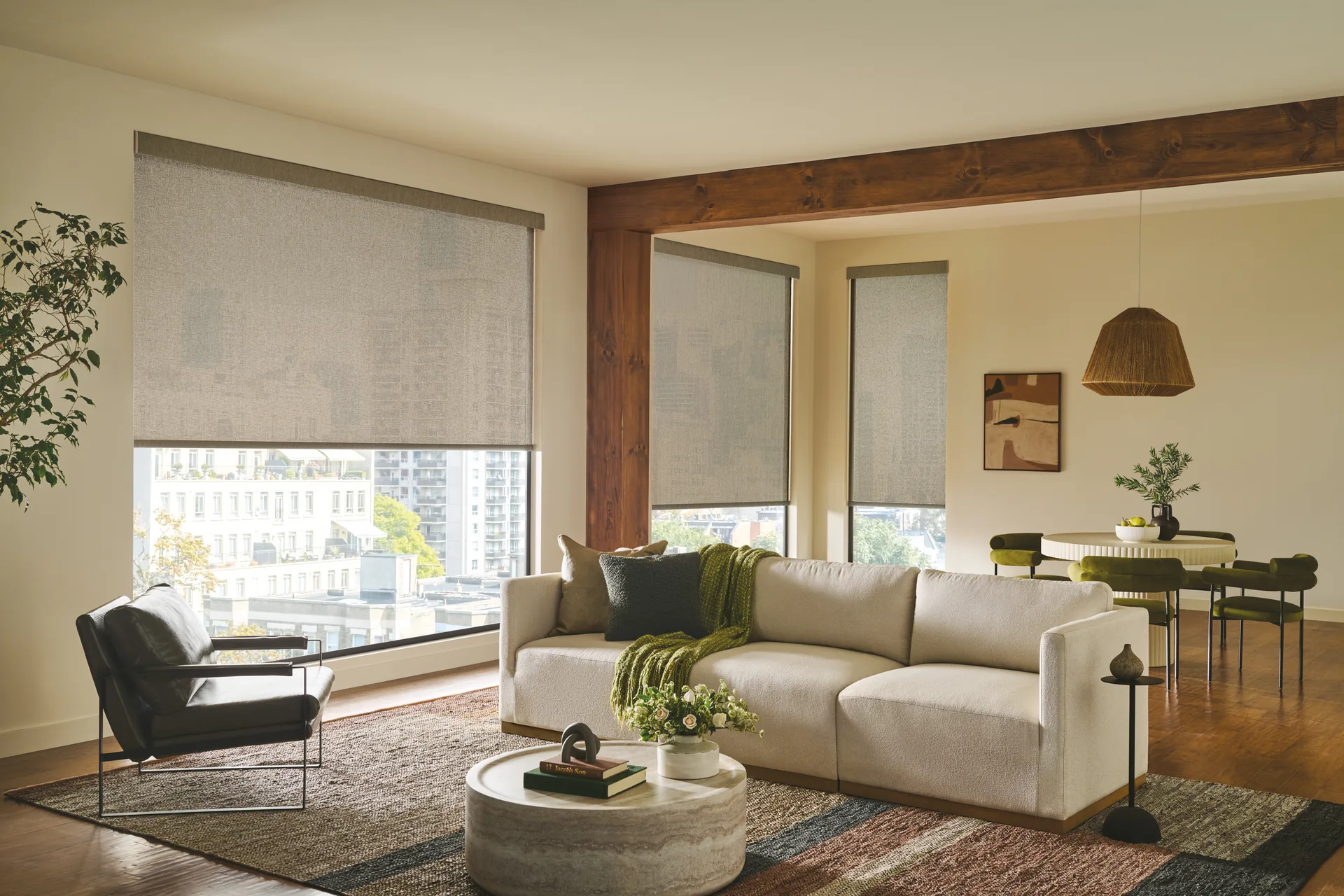 Neutral textured Designer Roller Shades in a warm living room